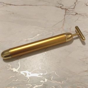 Gold plated face massager